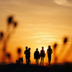 People walking in the sunset