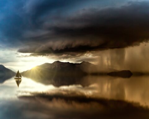 boat out at sea at dusk