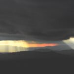 Sunlight through storm clouds