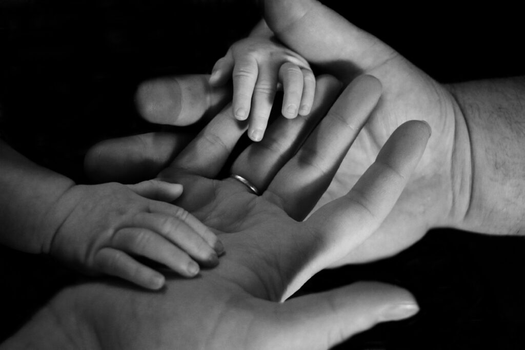 Mother and child hands