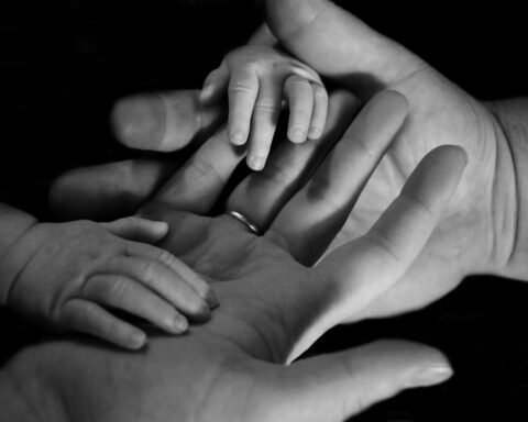 Mother and child hands