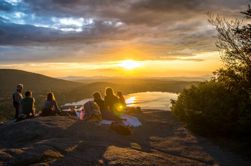 Group of people watching a sunset