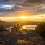 Group of people watching a sunset