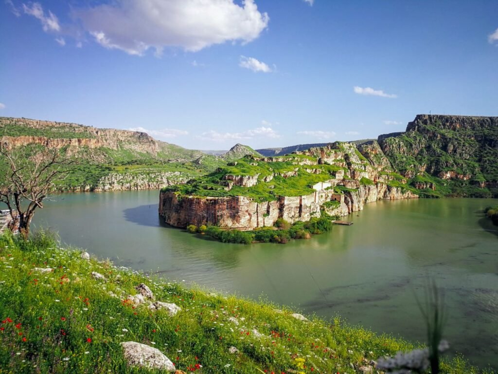 Breathtaking landscape of Rumkale fortress on the Euphrates River surrounded by nature.